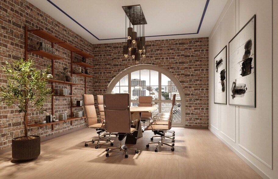 Building Photo - Spacious Furnished Studio in Prime Luxury Building