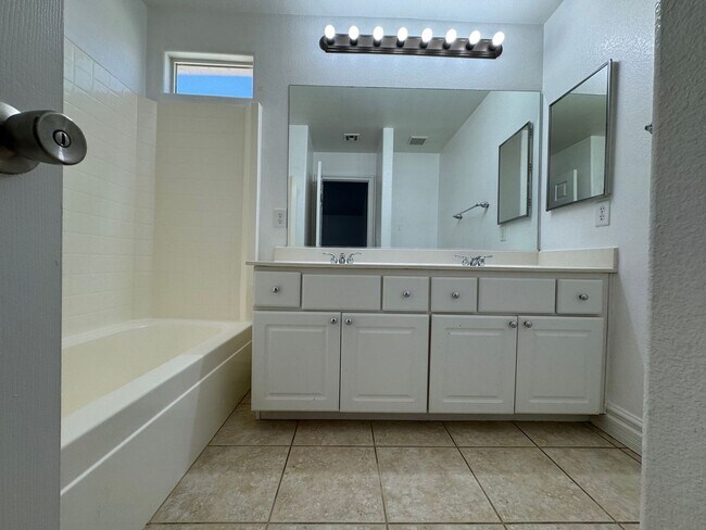Building Photo - STUNNING 2 STORY HOME IN A GUARD GATED COM...
