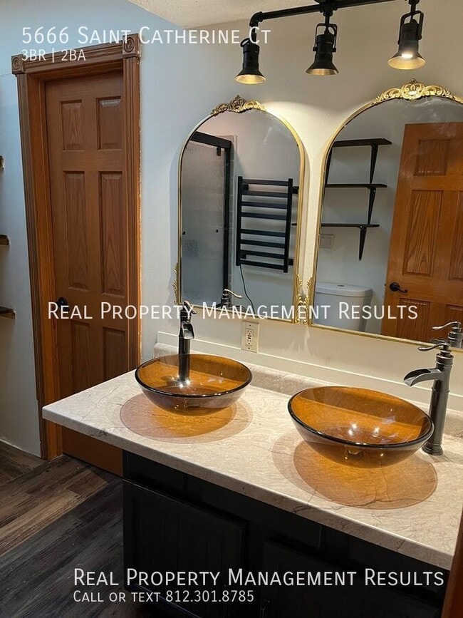 Building Photo - 5666 St Catherine Ct