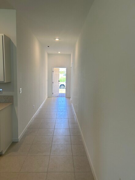Hallway from Main Room to Front Door - 4213 Longmour Ln