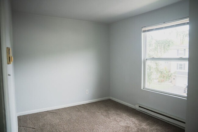 Building Photo - $100 OFF SPECIAL - Austin Street Homes - Comfort & Convenience Combined – 2BR Townhomes Now Leasing