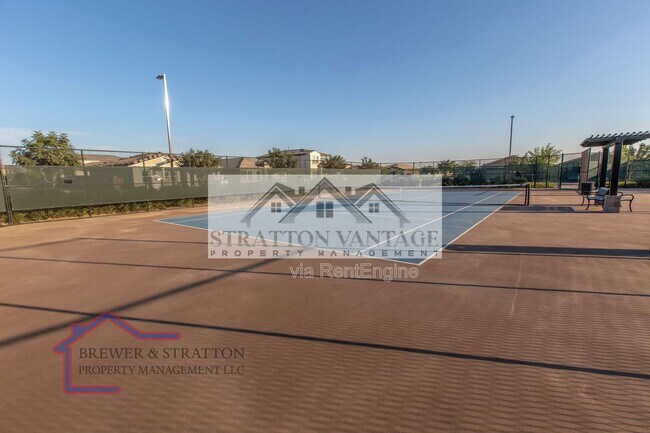 Building Photo - 9638 E Tesla Ave