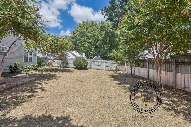 Building Photo - "Charming 4-Bedroom Retreat with Fireplace & Hardwood Floors on Michelle Drive!"