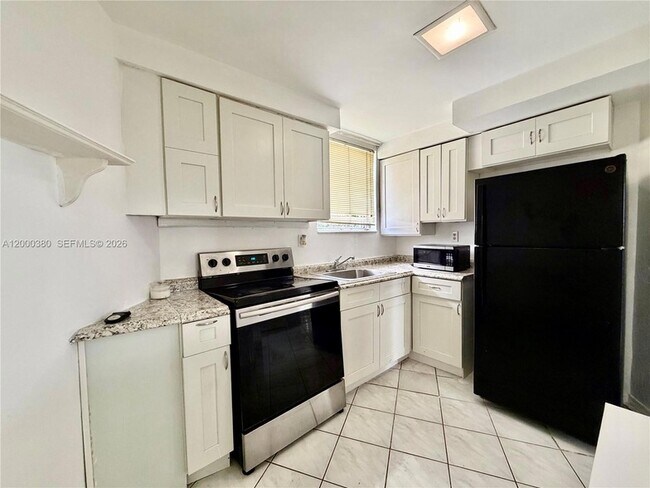 Building Photo - 1701 NE Miami Gardens Dr