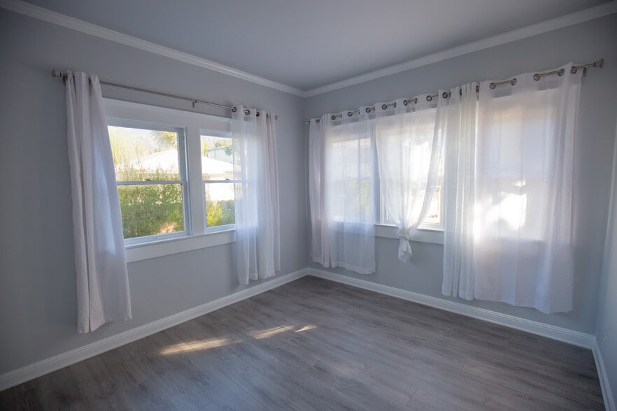 Bedroom #1. Sunny and bright. Large windows on 2 walls. Very quiet. No shared walls. - 652 N Marengo Avenue