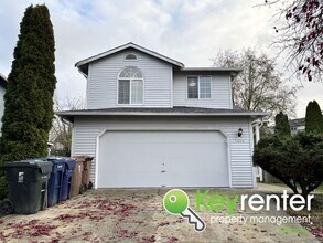 Building Photo - Spacious Northeast Tacoma 3 Bedroom 2.5 Bathroom Home for Rent in Secluded Neighborhood!
