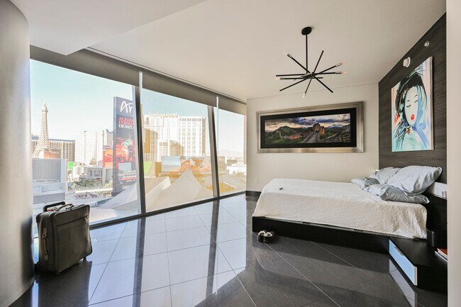 Building Photo - Wake Up to the Las Vegas Skyline – Premium 2-Bedroom Unit with Wall-to-Wall Windows