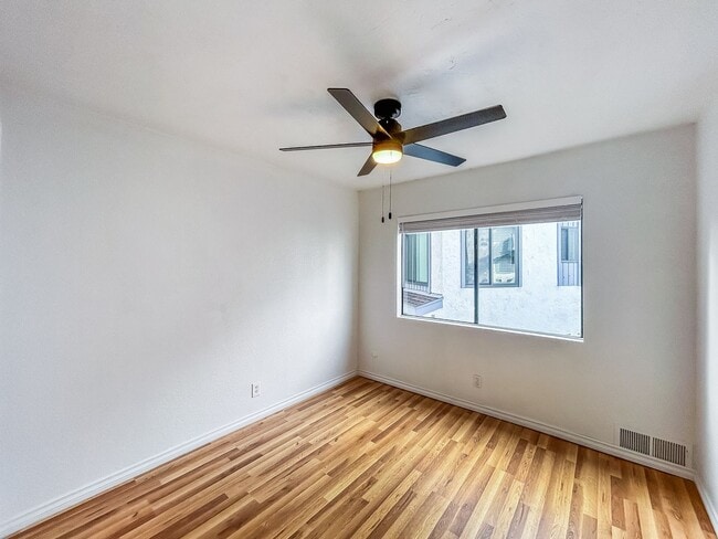 Building Photo - Beautiful 2BD/2BA W/ Private Balcony and In-Unit Laundry in Midway District!