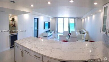 Building Photo - 5701 Collins Ave