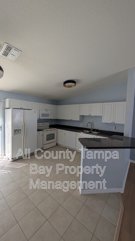 Building Photo - 1716 W Flora St