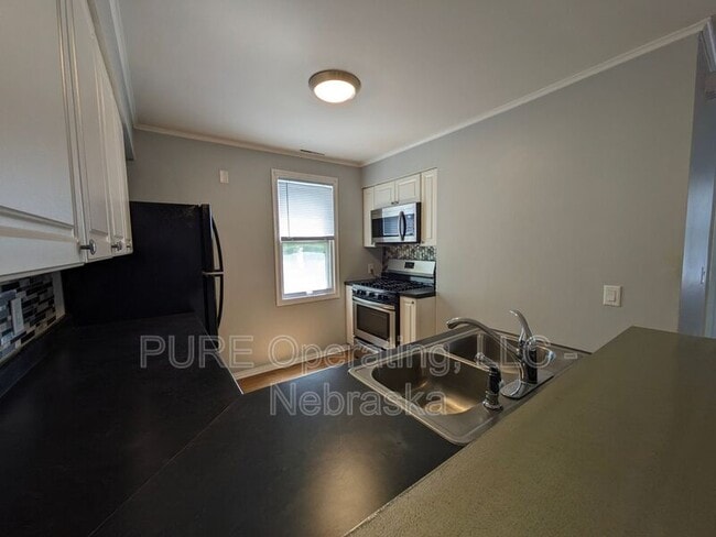 Building Photo - 1115 William St