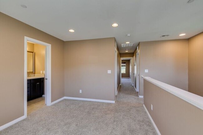 Building Photo - Better Than New with Stunning Designer Upgrades Throughout!