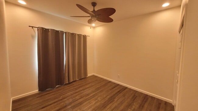 Building Photo - This 3-bedroom, 2-bath home in Orchidland Subdivision