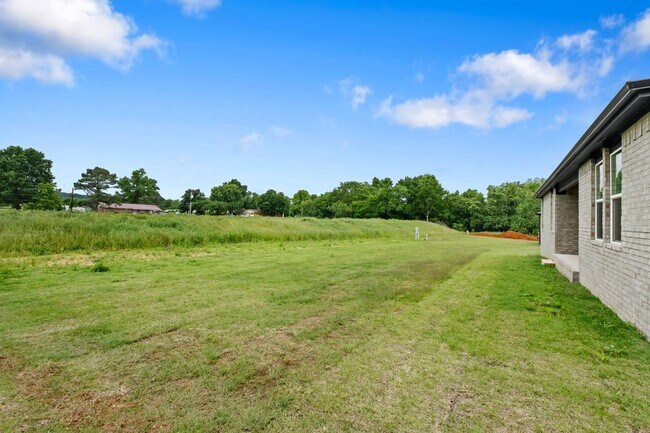 Building Photo - Stunning New 4-Bedroom Home with Modern Up...