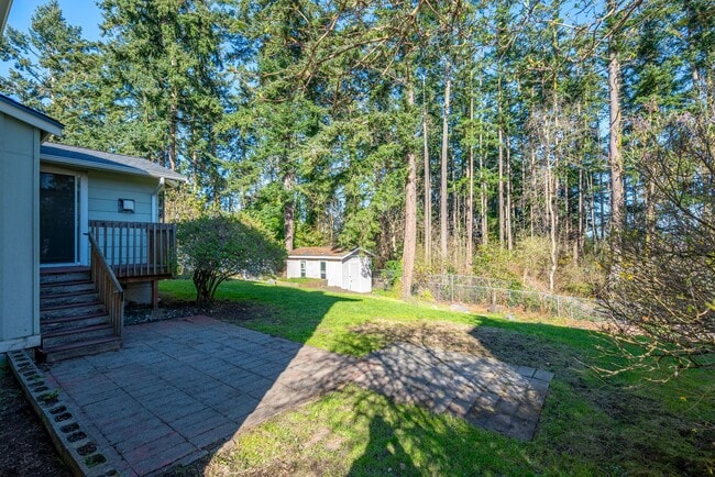 Building Photo - Spacious 4-Bedroom Home with Fireplace, Fenced Yard, and 2-Car Garage