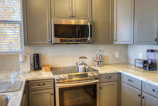Building Photo - Welcome Home! Fully Furnished with Month to Month leasing options available. Contact us today to ...