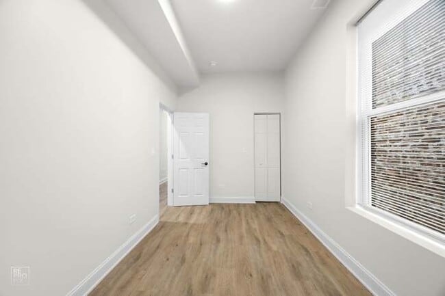 Building Photo - 6613 S Vernon Ave