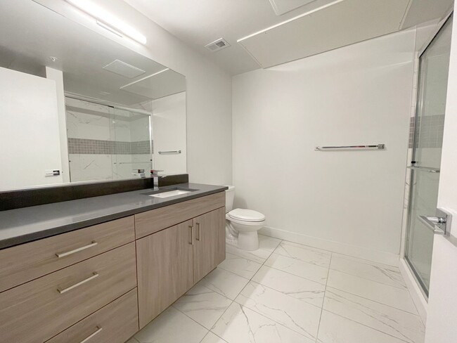 Building Photo - Improved Price!!!! Bustling Location! Mode...