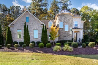 Building Photo - Stunning 5-Bedroom, 5-Bathroom Home with C...