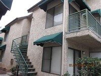 Building Photo - CENTRAL - GATED WITH POOL AREA