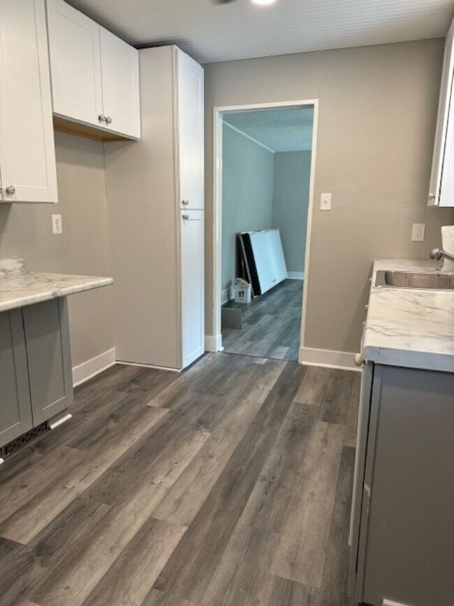 Building Photo - HOT OFF THE PRESS!