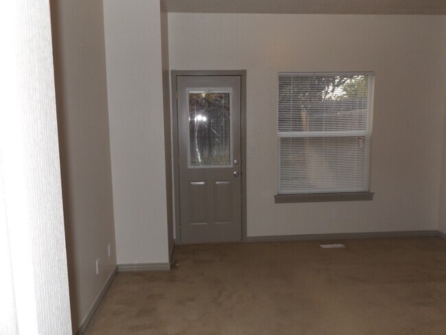 Building Photo - Spacious 3 Bedroom, 2 Bathroom Duplex with Two Car Garage and Fenced Yard!