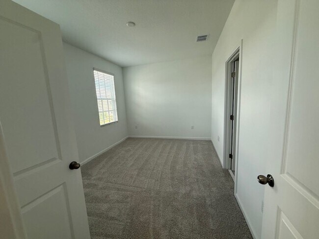 Building Photo - Brand new construction 3 Bedroom Town Home in Island Village of Celebration