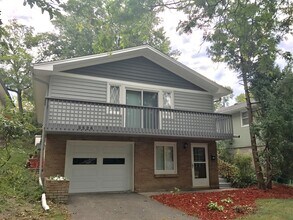 Building Photo - Robbinsdale's 3-Bedroom Home with Walk-Out Deck!