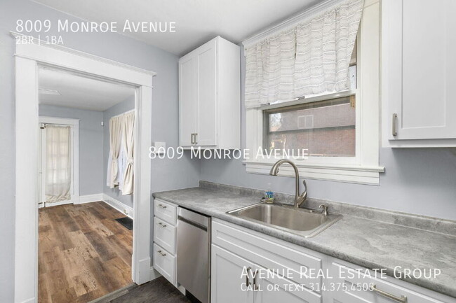 Building Photo - 8009 Monroe Ave