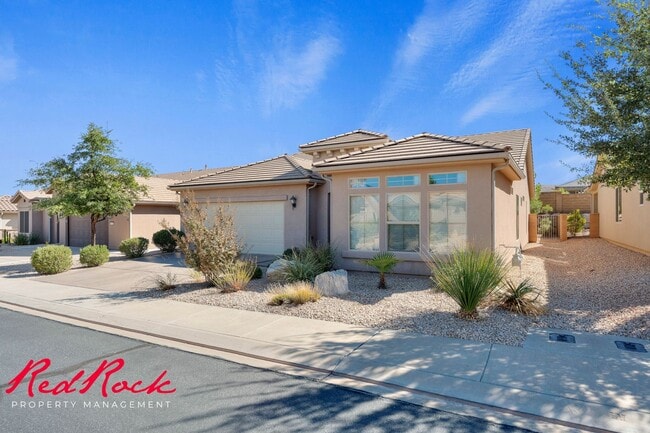 Building Photo - Sun River 2 Bedroom Home with Bonus Den! First Class Amenities!