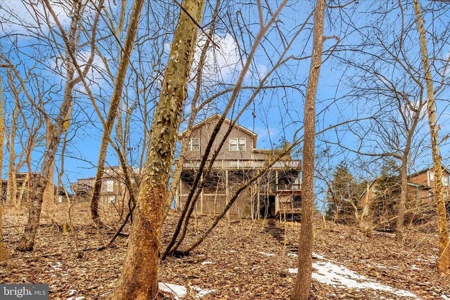 Building Photo - 6976 Meadowpoint Terrace