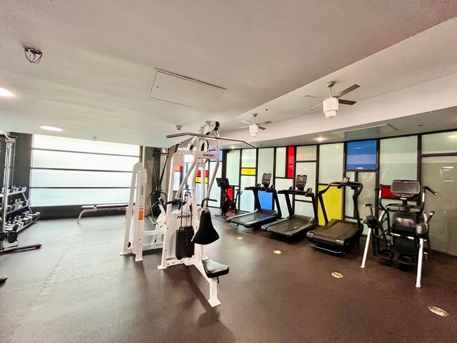 Building Photo - Stunning Corner Loft in East Village with Floor-to-Ceiling Windows & City Views!