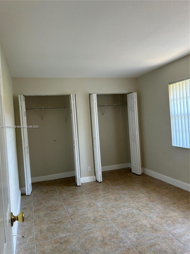 Building Photo - 3890 NW 79th Ave