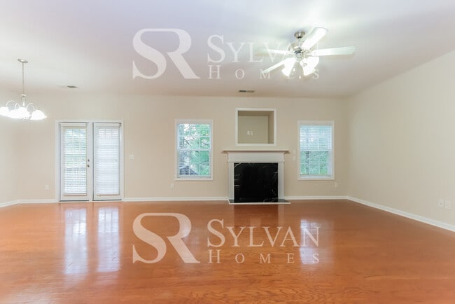 Building Photo - Turn the key. Enter. Smile. Repeat every day!