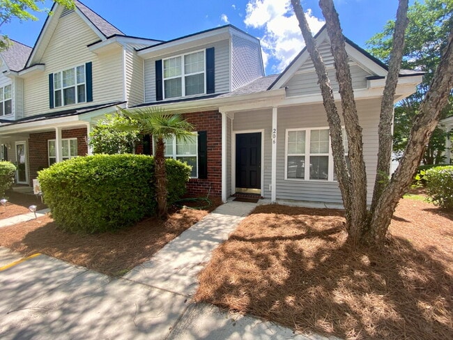 Building Photo - Spacious Townhome located in The Townes at...