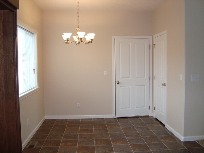 Building Photo - Pet Friendly Single Family Home w/attached garage and RV Parking