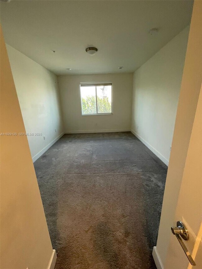 Building Photo - 6416 NW 102nd Ct