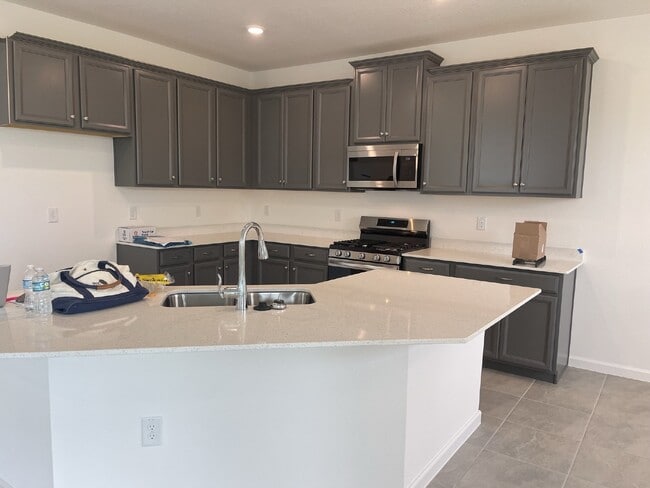 Building Photo - "Spacious 4-Bedroom Oasis with 3 Full Bath...