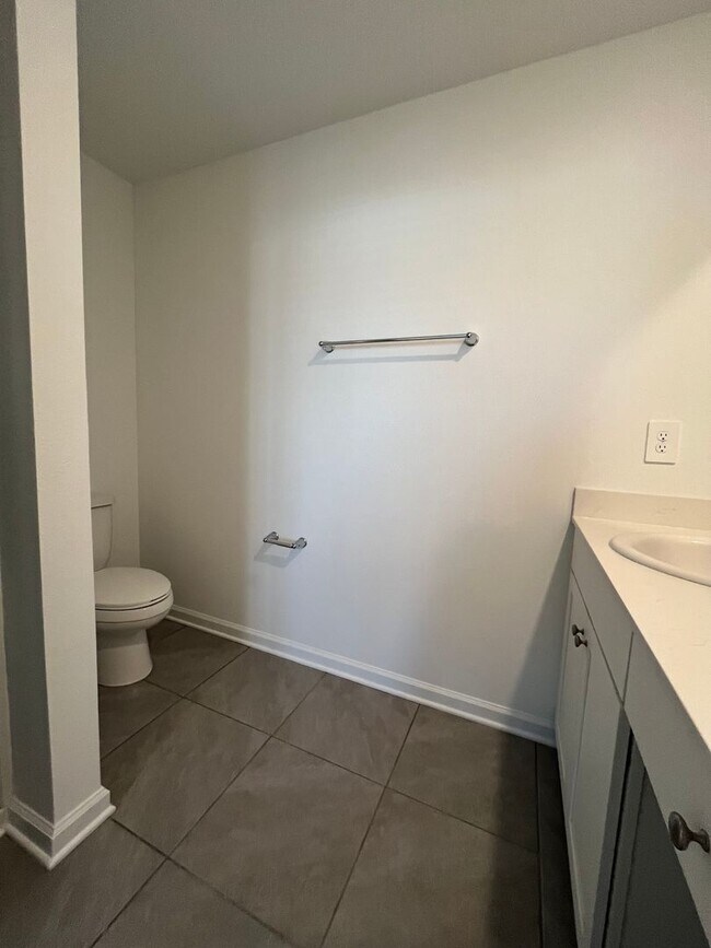 Building Photo - Town Home in The Trails -2 Primary Suites!!