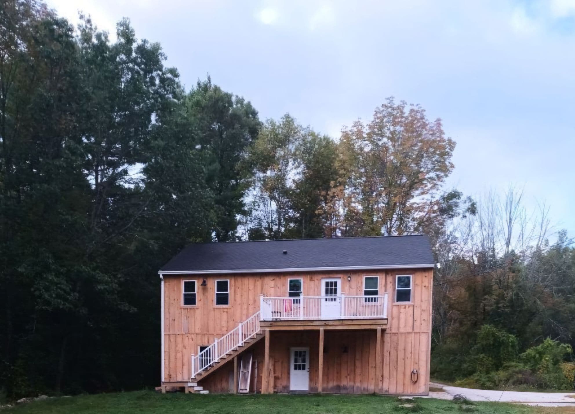 View of unit from nearby meadow - 57 River Rd