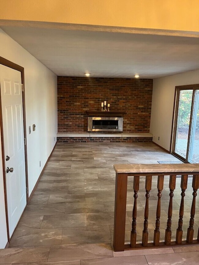 Building Photo - Spacious, Fully Updated Home with Walkout Basement on a Mature Lot