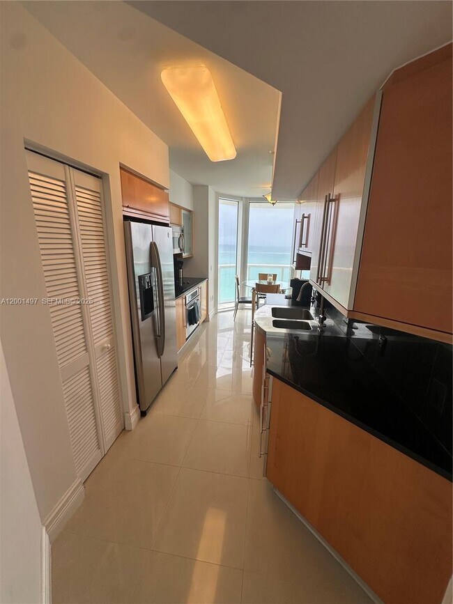 Building Photo - 6365 Collins Ave