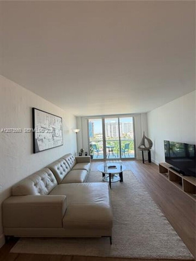 Building Photo - 19370 Collins Ave