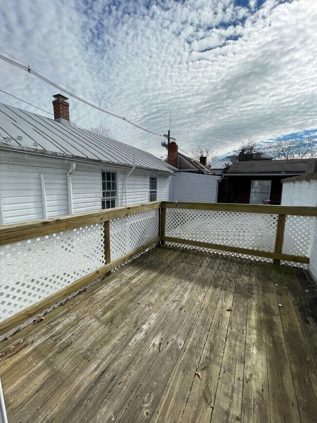 Building Photo - Small pets are welcome with an additional ...