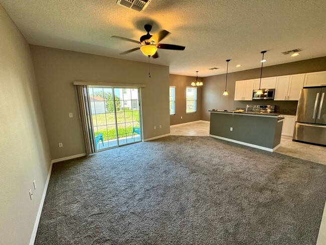 Building Photo - Move in ready 3/2 New Construction Townhou...