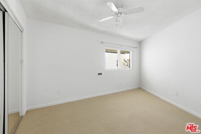 Building Photo - 8401 Tuscany Ave