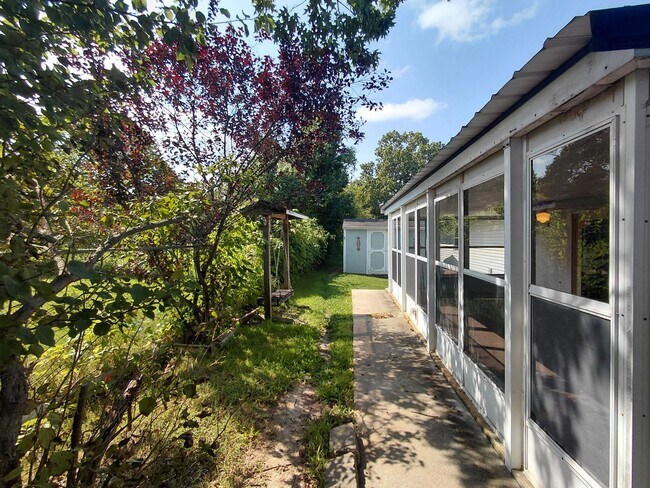 Building Photo - Fenced home close to post!