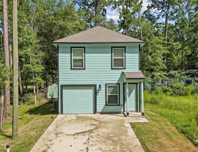 Building Photo - For lease in the sought-after Cedar Point community, this delightful home boasts 1,065 square fee...