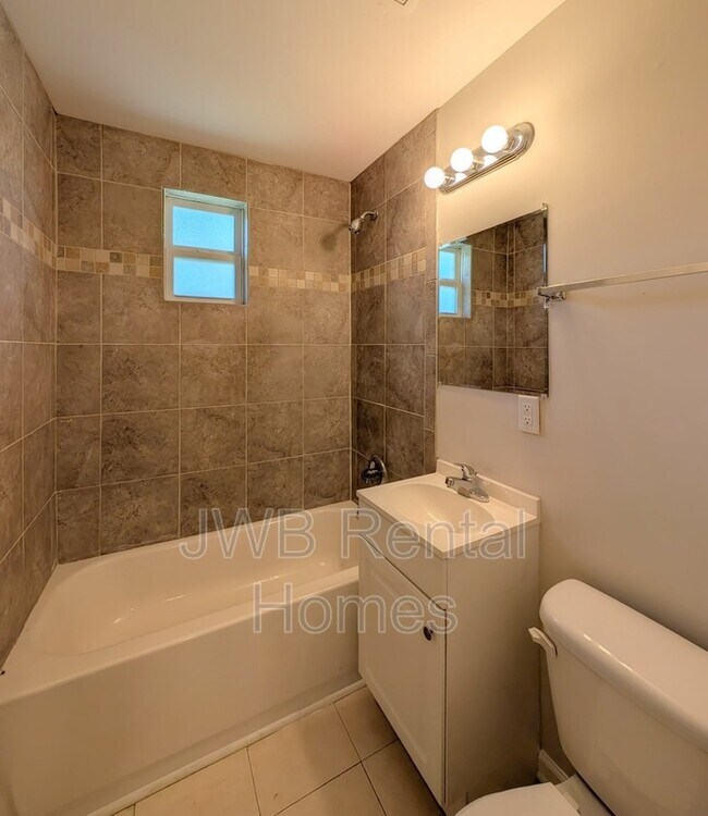 Building Photo - 9064 11th Ave