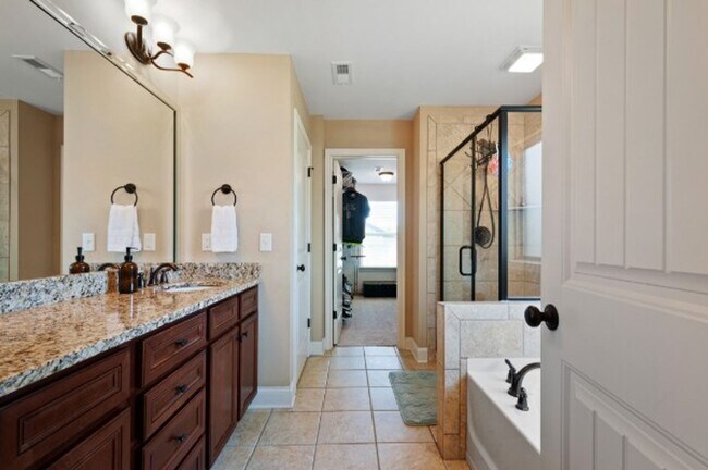 Building Photo - Coming Soon. The Reserve at Stone Hall. Custom home with 2,749 sq ft 4 BR 3 baths, walk to Ravenw...